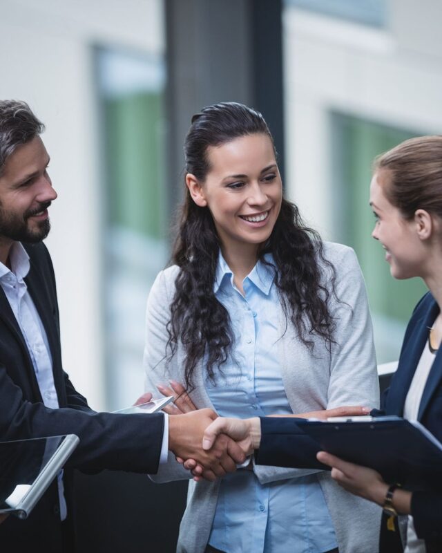 businesspeople-having-discussion-office businesspeople-having-discussion-office